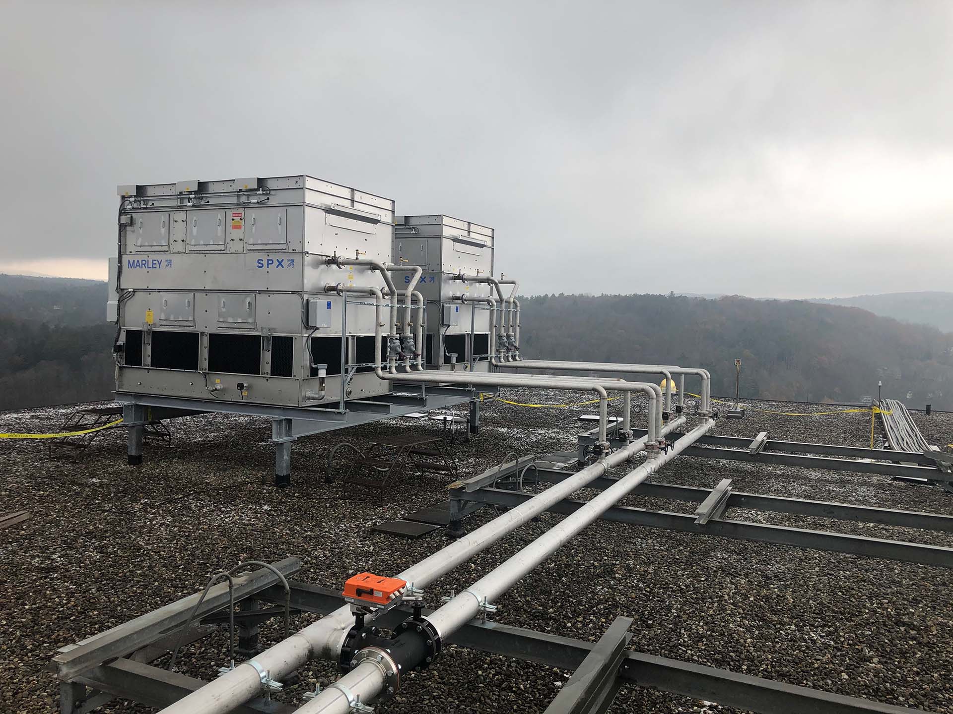 HVAC system units and pipes on rooftop