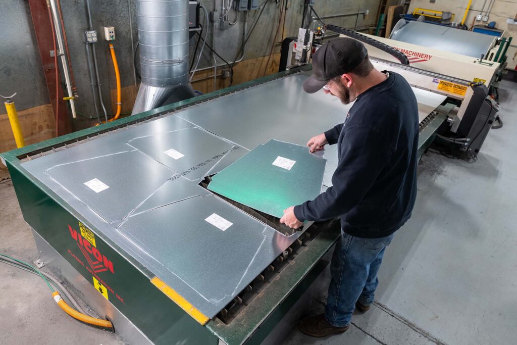 Man working at VICON plasma cutter