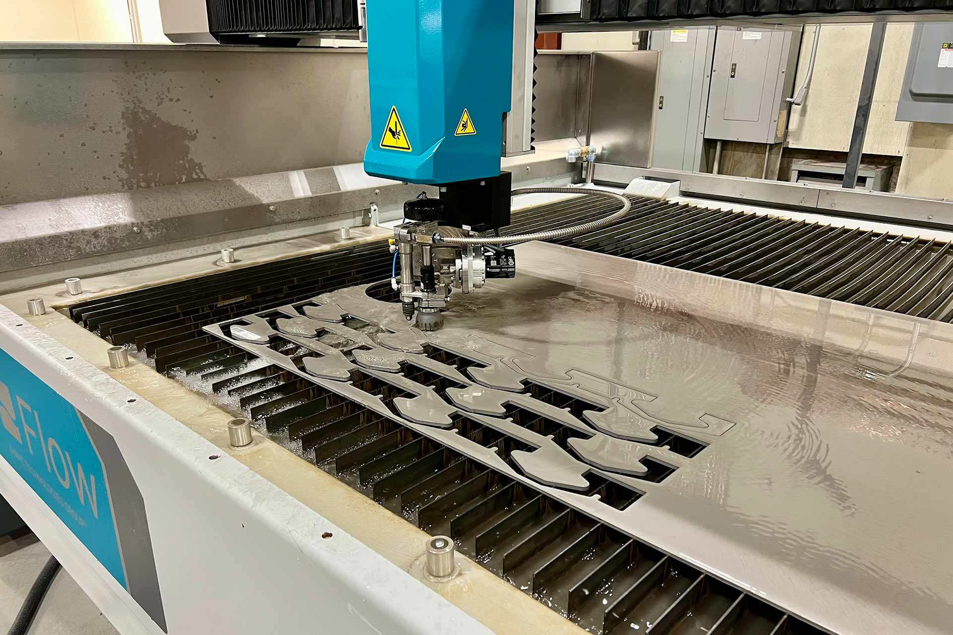 Waterjet machine cutting metal