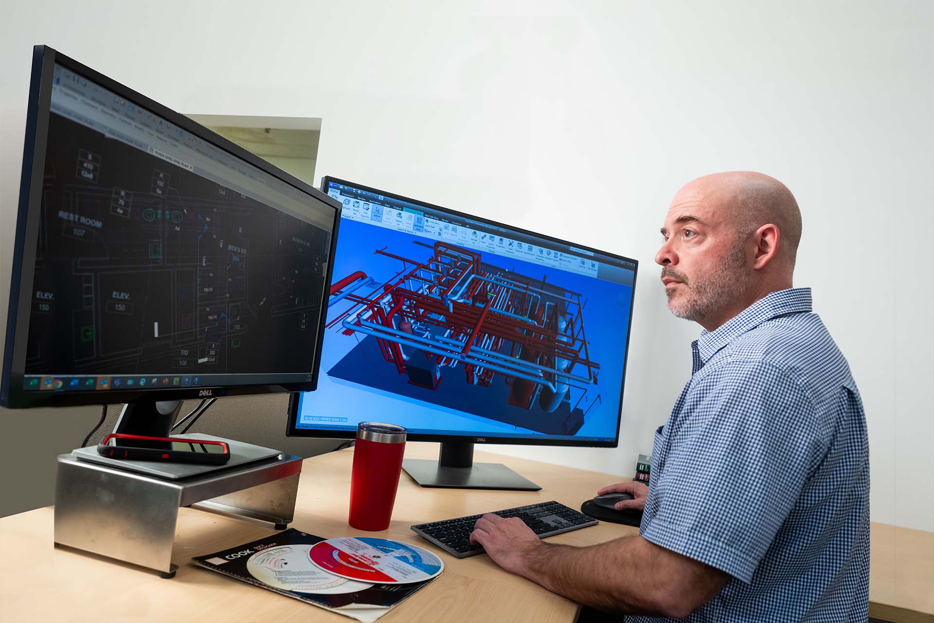 employee using Revit software on a computer