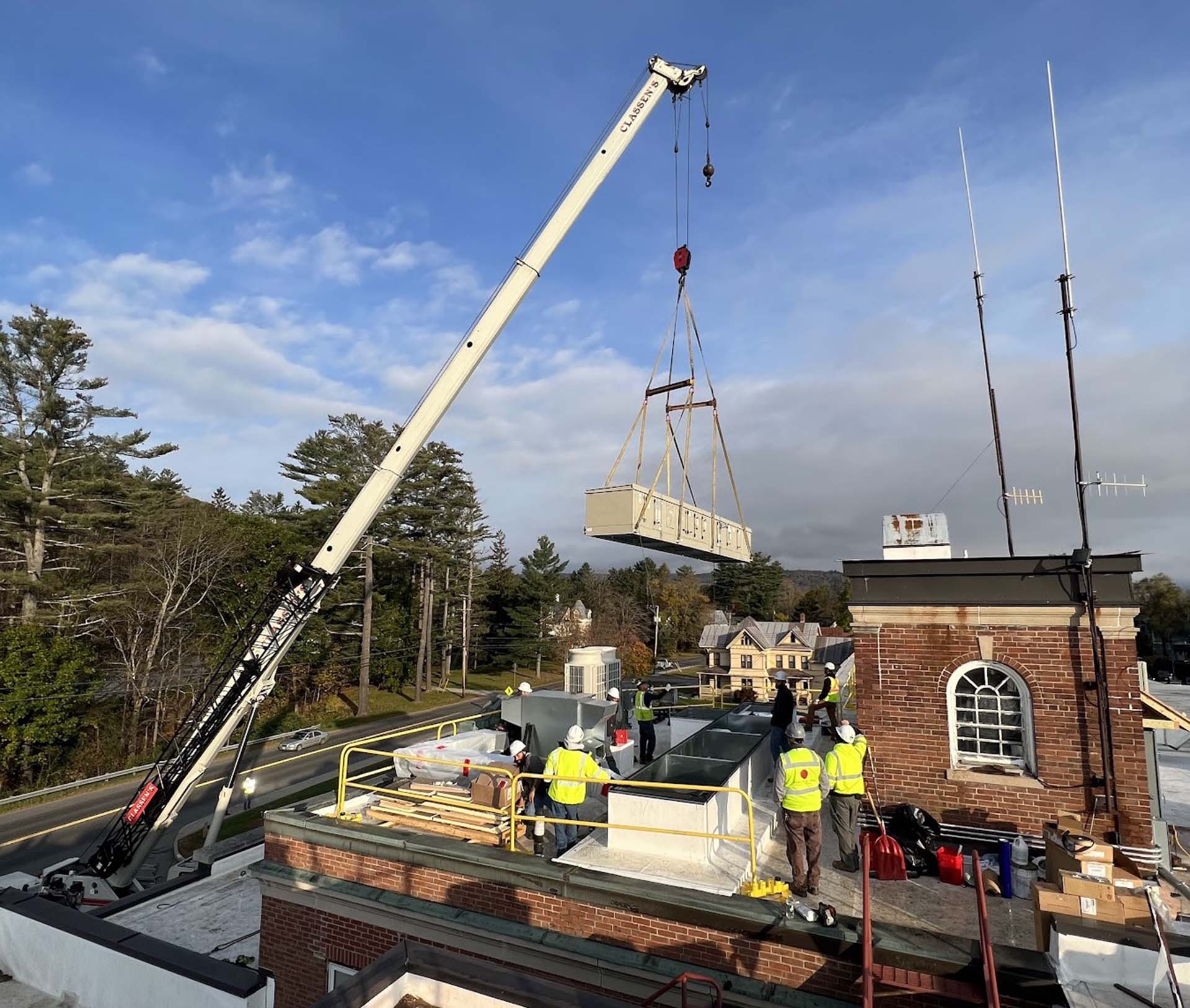 crew installing new ER air handling system on Gifford Health Care rooftop